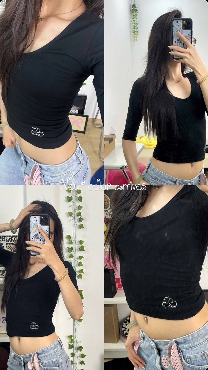 Tiemmem 3/4 Sleeve Top in Black, primary product photograph